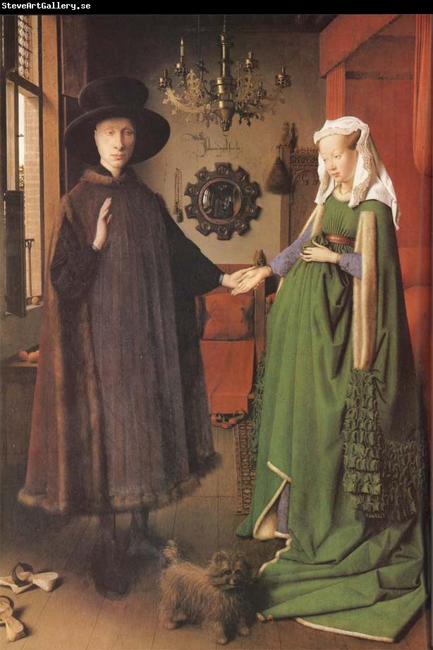 Jan Van Eyck Giovanni Arnolfini and his Bride